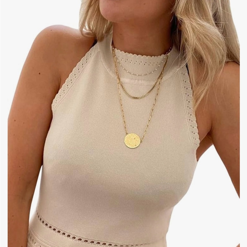 Sleeveless sweater top. New.